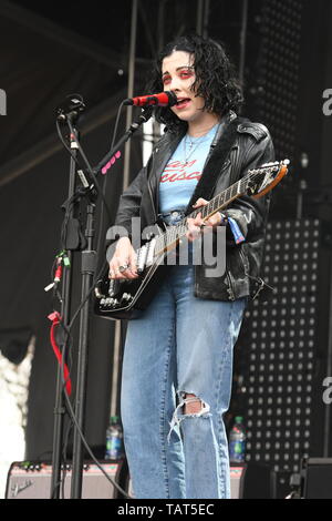 Singer, songwriter and guitarist Heather Baron-Gracie is shown performing on stage during a 'live' stand up appearance with the Pale Waves. Stock Photo