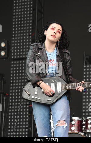 Singer, songwriter and guitarist Heather Baron-Gracie is shown performing on stage during a 'live' stand up appearance with the Pale Waves. Stock Photo