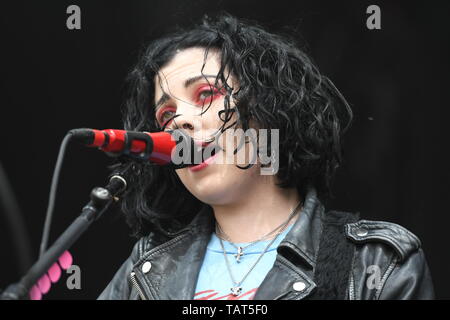 Singer, songwriter and guitarist Heather Baron-Gracie is shown performing on stage during a 'live' stand up appearance with the Pale Waves. Stock Photo