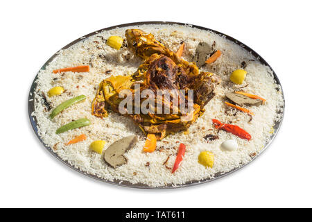 Mandi is a traditional dish from Yemen of meat, rice, and spices. It is now very popular in other areas of the Arabian Peninsula. Stock Photo