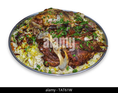 Mandi is a traditional dish from Yemen of meat, rice, and spices. It is now very popular in other areas of the Arabian Peninsula. Stock Photo