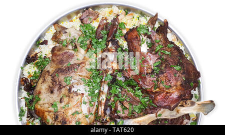 Mandi is a traditional dish from Yemen of meat, rice, and spices. It is now very popular in other areas of the Arabian Peninsula. Stock Photo