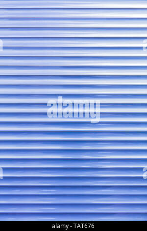 Background and texture of light blue metallic blinds in a horizontal line. Stock Photo