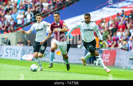 Anwar El Ghazi of Aston Villa gets between Tom Lawrence of Derby (left) and Tom Huddlestone of Derby during the EFL Sky Bet  Championship Play-Off Final match between Aston Villa and Derby County at Wembley Stadium , London , 27 May 2019 Editorial use only. No merchandising. For Football images FA and Premier League restrictions apply inc. no internet/mobile usage without FAPL license - for details contact Football Dataco Stock Photo