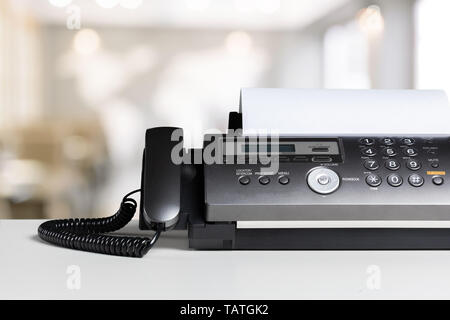 Fax machine in office Stock Photo