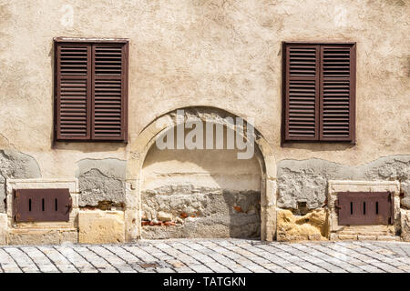 Closed window blind on Medieval house Stock Photo