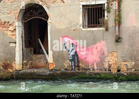 The shipwrecked migrant child graffiti by Banksy, Venice 2019 Stock Photo