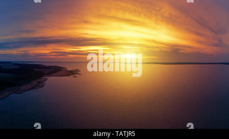 Stunning sunset over the lake, aerial view Stock Photo
