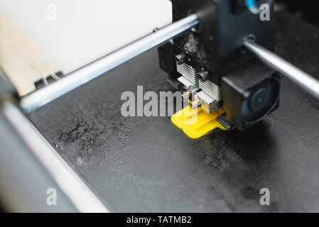 Process of printing physical plastic model on automatic 3d printer machine. Additive technologies, 3D printing and prototyping industry concept Stock Photo