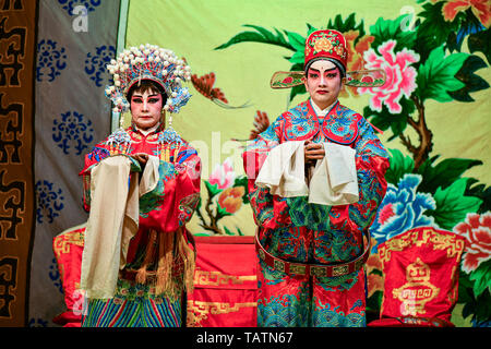 Chinese Opera actor and actress with full makeup Stock Photo