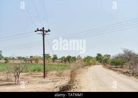 A dust trail on the outskirts of Pune, Maharashtra, India Stock Photo