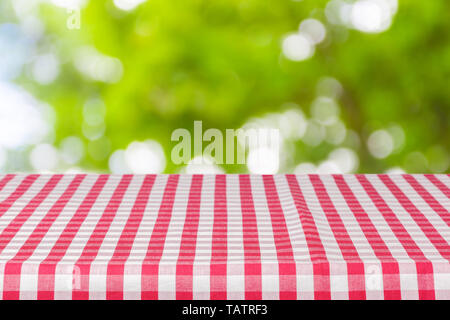 Background with tablecloth on wooden table Stock Photo