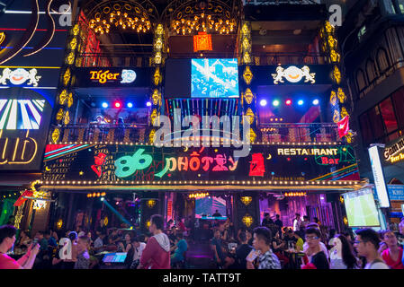 Ho Chi Minh City, Vietnam - April 14, 2019: 86 Pho Tay bar in Bui Vien Street at night. Bui Vien Street is a famous nightlife area of Saigon. Stock Photo
