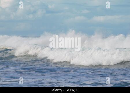 Blue water and rough white wave so typical for the Australian ocean Stock Photo