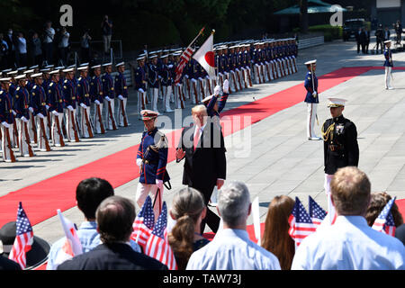 U.S. President Donald Trump reviews the honor guard during a State Call to the Imperial Palace May 27, 2019 in Tokyo, Japan. Stock Photo