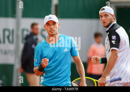 Paris, France. 28th May, 2019. Ben McLachlan of Japan and Jan-Lennard Struff of Germany during the Men's doubles first round match of the French Open tennis tournament against Jeremy Chardy and Fabrice Martin of France at the Roland Garros in Paris, France on May 28, 2019. Credit: AFLO/Alamy Live News Stock Photo