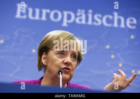 (190528) -- BRUSSELS, May 28, 2019 (Xinhua) -- German Chancellor Angela Merkel speaks during a press conference after an informal dinner of EU heads of state or government at the European Union headquarters in Brussels, Belgium, on May 28, 2019. The European Union (EU) member states leaders didn't discuss names of the candidates but only the process to choose new president of the European Commission (EC), European Council President Donald Tusk said here Tuesday. During a press conference following the leaders informal dinner, Tusk told reporters that Tuesday's discussion confirmed the agreemen Stock Photo