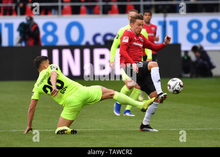 Ingolstadt, Deutschland. 28th May, 2019. Goekhan GUEL (WI) action, duels versus Konstantin KERSCHBAUMER (FC Ingolstadt). Soccer 2. Bundesliga/FC Ingolstadt-SV Wehen Wiesbaden 2-3, Relegation, League2, Season 2018/19 on 28/05/2019. AUDI SPORTPARK., DFL REGULATION PROHIBIT ANY USE OF PHOTOGRAPH AS IMAGE SEQUENCES AND/OR QUASI VIDEO. | usage worldwide Credit: dpa/Alamy Live News Stock Photo