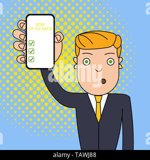 Writing note showing Stay Up To Date. Business concept for knows all the most recent news and changes in a situation Man Holding Vertical Smartphone D Stock Photo