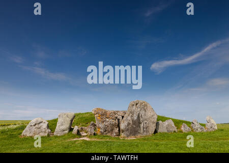 West Kennet Long Barrow is a Neolithic tomb or barrow, situated on a prominent chalk ridge, near Silbury Hill, one-and-a-half miles south of Avebury. Stock Photo