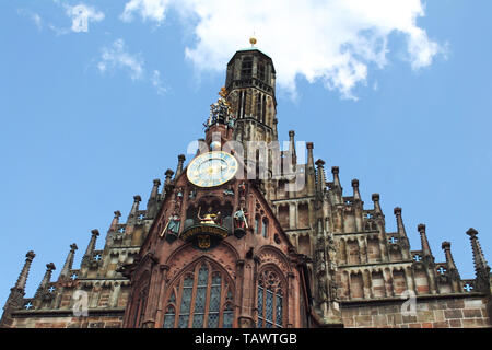 Front view of Frauenkirche church in Nuremberg, Bavaria, Germany.Very beautiful monument of gothic style with colourful statues, touristic attraction Stock Photo