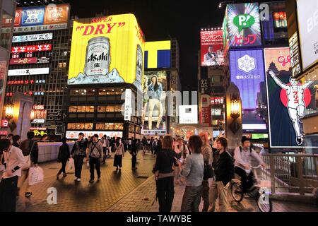 OSAKA, JAPAN - APRIL 24, 2012: People shop in Shinsaibashi area of Osaka, Japan. Osaka is Japan's 3rd largest city by population with 18 million peopl Stock Photo