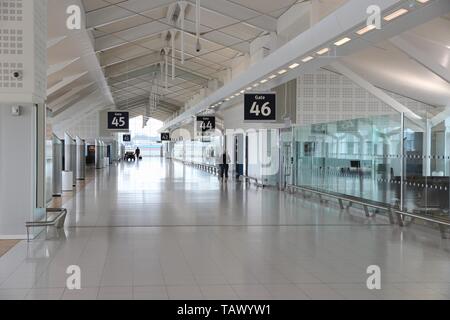 BIRMINGHAM, UK - APRIL 24, 2013: Travelers wait at Birmingham International Airport, UK. With 8.9 million travelers served it was the 7th busiest UK a Stock Photo