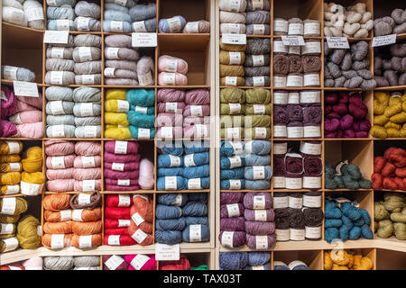 Multiple colours of wool, Dartington Centre, Totnes, Devon, UK Stock Photo