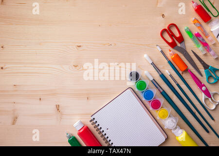 Back to school. Items for the school on a wooden table Stock Photo