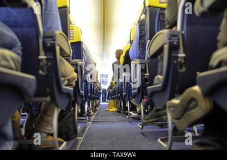 Caselle Airport, province of Turin, Piedmont region, Italy. June 14 2018. Internal view of the Ryanair flight to London Stansted airport. Passengers a Stock Photo