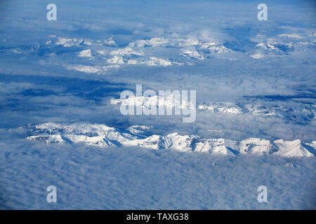 Canadian Rockies aerial view near the atmosphere Stock Photo