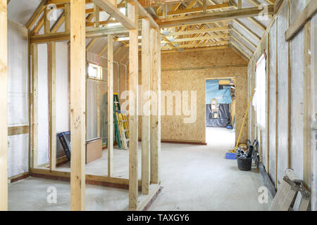 Interior of a UK timber frame house under construction Stock Photo