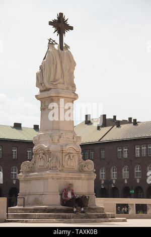 Elder man relaxing on the streets of Szeged, Hungary Stock Photo