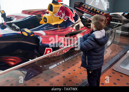 dh National museum of Scotland CHAMBER STREET EDINBURGH Scottish museums exhibit David Coulthard Red Bull formula one racing car child Stock Photo