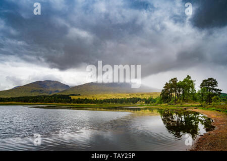 Loch Tulla, Bridge of Orchy, Scotland.  Loch Tulla is a small loch near Glen Coe and Rannoch Moor in the central highlands of Scotland  on The West Highland Way Stock Photo