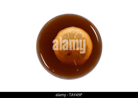 Lemon tea cup top view with lemon slice isolated on white background Stock Photo