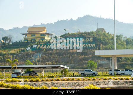 Nakaraj Nakhon, Laos - Feb 2016: Border crossing from Thailand to Lao at Chiang Khong-Huay Xai Friendship Bridge with big sign 'Welcome to Laos' Stock Photo