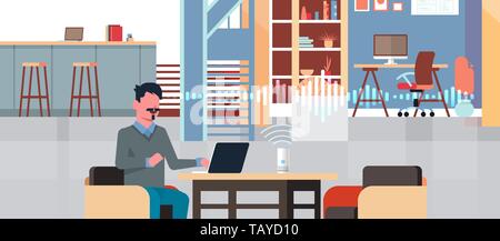 man sitting at workplace with laptop using intelligent smart speaker with voice recognition artificial intelligence assistance concept modern Stock Vector