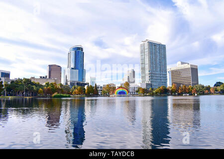 Orlando, Florida . December 25, 2018. Colorful vintage fountain , business buildings and autumn trees at Lake Eola Park in Orlando Downtown area (6) Stock Photo