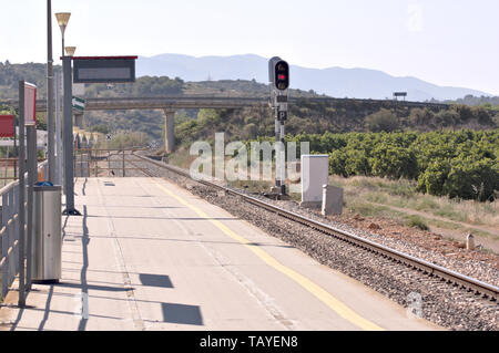 View of a station of the Spanish commuter railroad located in a rural area Stock Photo