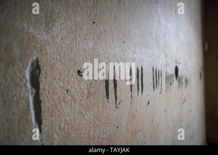Wall marks at the S-21 Tuol Sleng Genocide Museum, Phnom Penh, Cambodia. Stock Photo