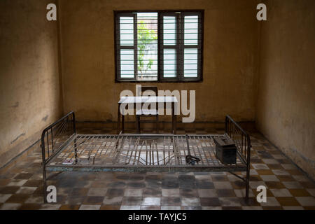 A torture cell room at the S-21 Tuol Sleng Genocide Museum, Phnom Penh, Cambodia. Stock Photo
