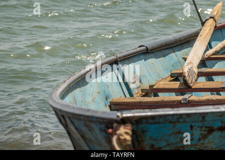 Old rusty fishing boat with flaking paint on the bank of the Nile in Sudan, Africa Stock Photo