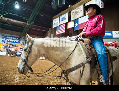 close up of a cowboy judge on horseback over seeing the safety of the competitors at rodeo event,stockyards, fort worth Texas,USA. Stock Photo