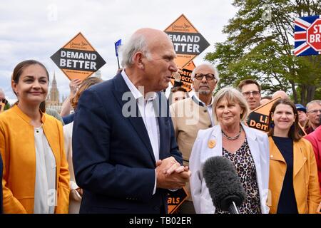 Vince Cable was joined by activists and the party's three new MEPs for London to celebrate the best ever European Election result in the Party's History. Vince Cable was joined by his wife Rachel Smith and Jo Swinson MP ( both to his right). Lambeth Palace Road, London Stock Photo