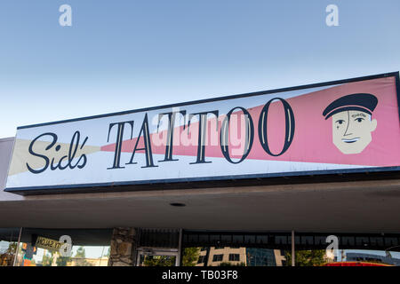 Tattoo store exterior sign Santa Ana California USA Stock Photo
