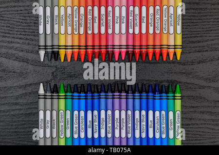 New sharp Generic Labeled Crayons in a straight line pattern.  No branding is present and color labels are easily editable.  There is some room for co Stock Photo