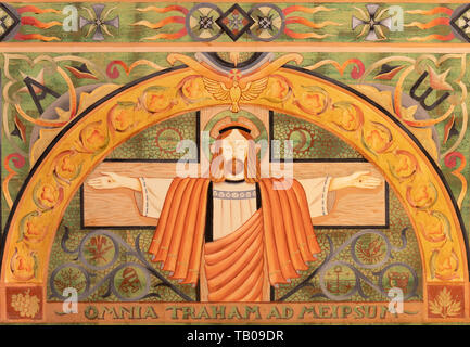 BELAGGIO, ITALY - MAY 10, 2015: The paint on the main altar on the wood - Jesus on the corss in church Chiesa di San Giacomo  from 20. cent. Stock Photo