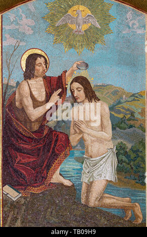 BELAGGIO, ITALY - MAY 10, 2015: The mosaic of the Baptism of Jesus in church Chiesa di San Giacomo by Venetian school from 20. cent. Stock Photo