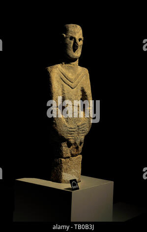 ANCIENT STONE CARVING OF A STANDING FIGURE, POSSIBLY THE OLDEST ON EARTH  from Gobekli Tepe on display in museum in Sanliurfa, Turkey Stock Photo